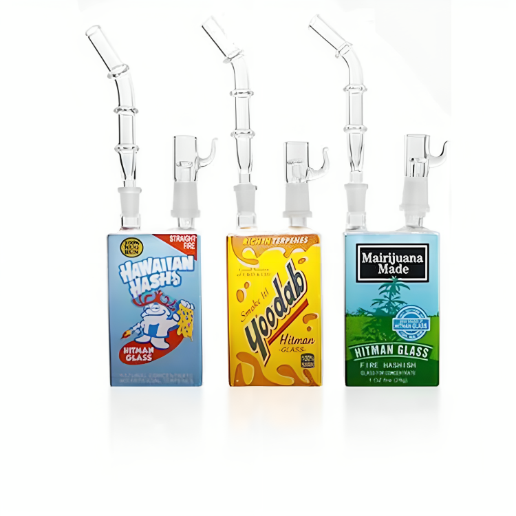 a group of juice boxes with tubes