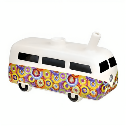 a white toy bus with colorful flowers on it