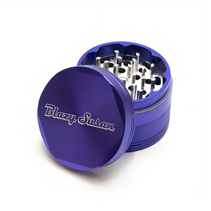 a blue metal grinder with a lid