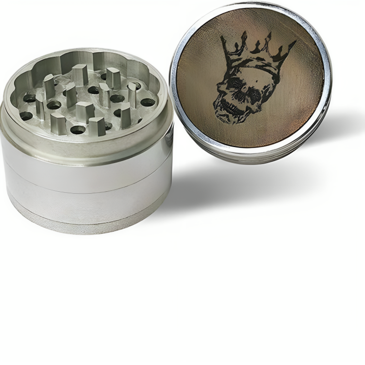a metal grinder with a skull design