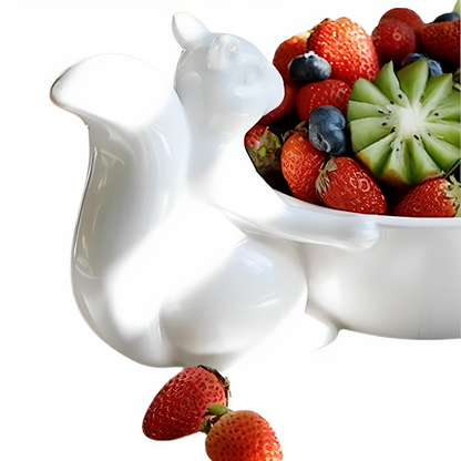a bowl of fruit in a squirrel shape