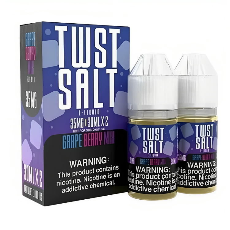 two bottles of liquid next to a box