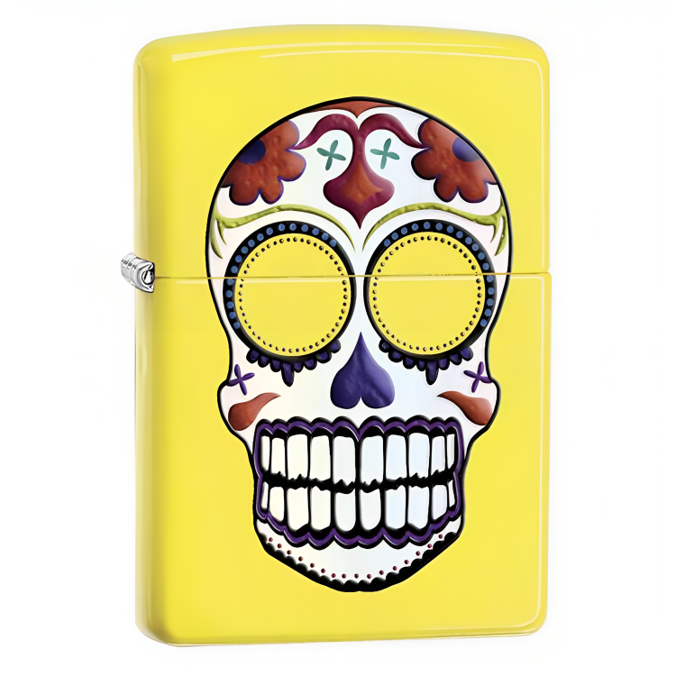 a yellow lighter with a skull on it